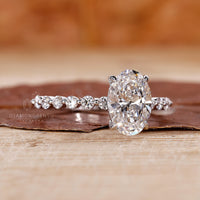 round diamond pave band with 4 claw prong setting.
