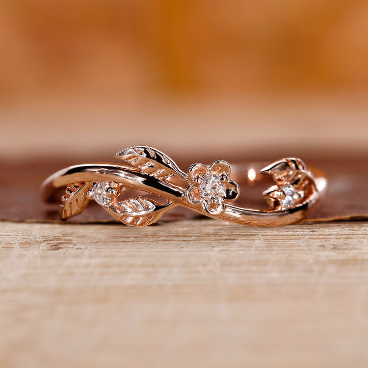 Nature inspired wedding band with leaf style twist band.