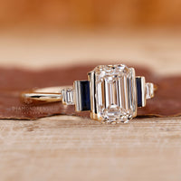 Half bezel ring with lab grown diamond and sapphire accents.