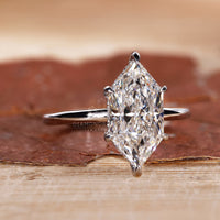 6 claw prong setting on Dutch marquise engagement ring.
