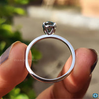Diamondrensu Australia engagement ring with an oval cut stone and claw prong setting.
