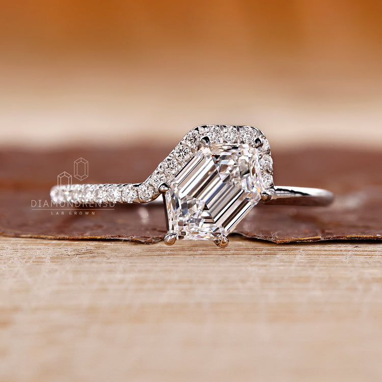 Unique engagement ring has hexagon cut shape.