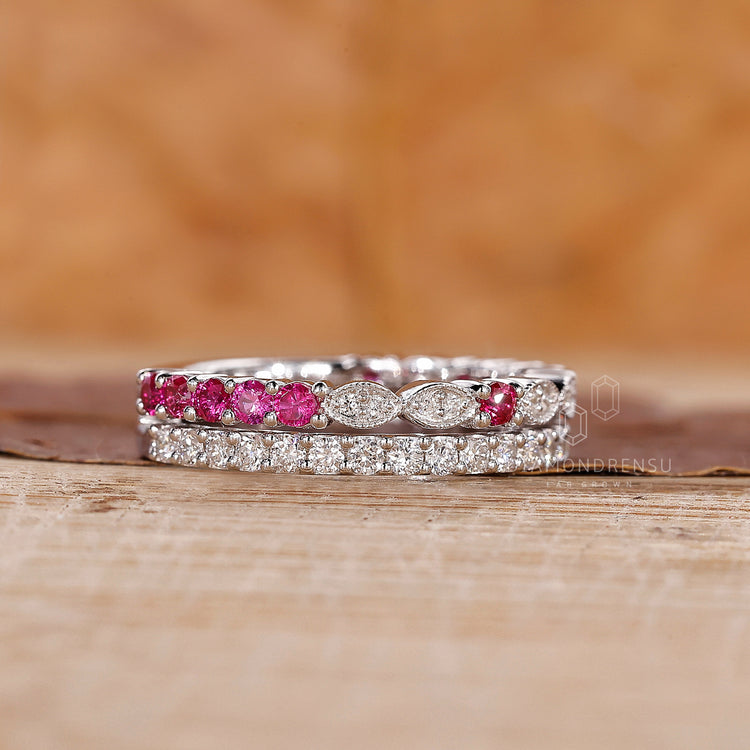 Milgrain setting band with round and marquise diamonds.