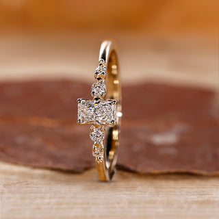 Yellow gold radiant cut engagement ring design.