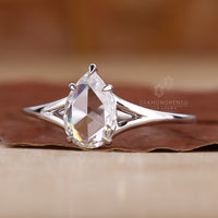 White gold engagement ring in claw prong setting.