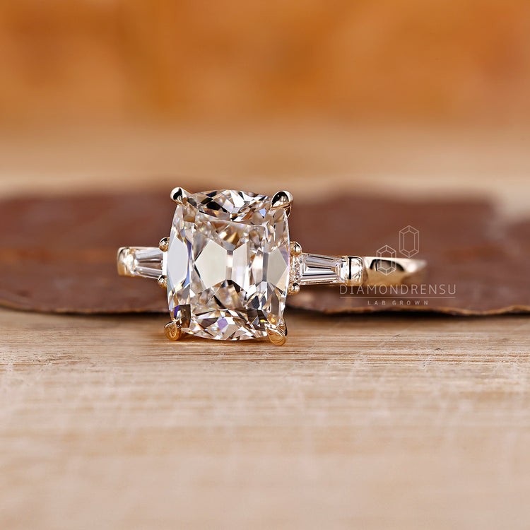 Basket setting cushion cut engagement ring.