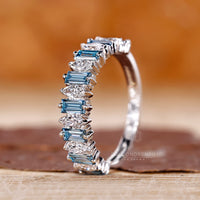 Marquise and blue baguette diamond band.
