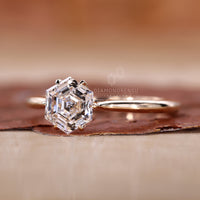 tapered shank engagement ring with cathedral setting.