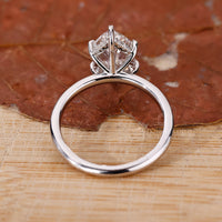 white gold ring with round cut hidden halo setting.