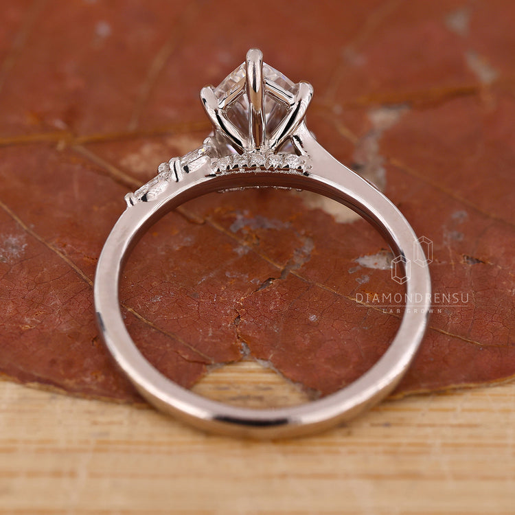 Cathedral setting ring with pave details.