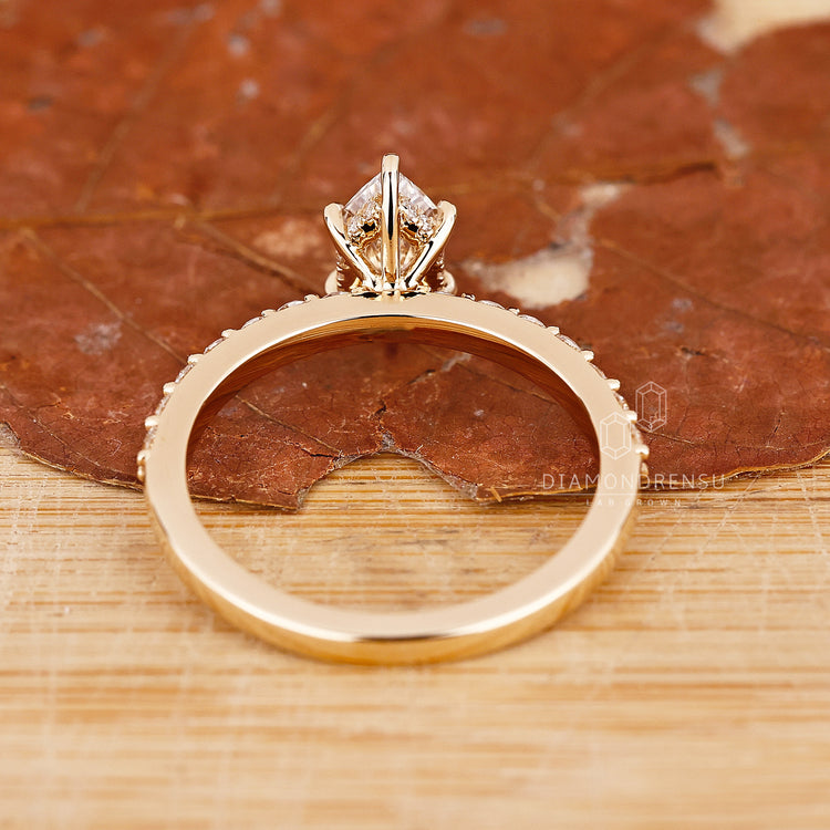 Buy Engagement ring in hidden halo engagement ring style.