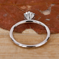 simple diamond ring in solitaire engagement ring style.