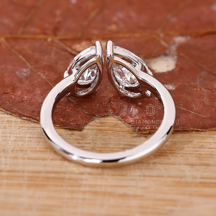 Buy engagement ring with two stone pear diamond style.