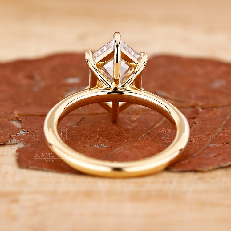 Custom diamond ring made with a 6 claw prong and handmade finish.