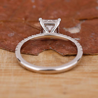 Unique round cut diamond engagement ring.
