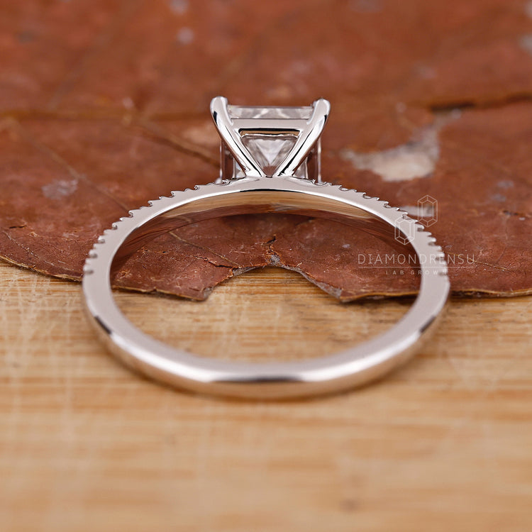 Unique round cut diamond engagement ring.