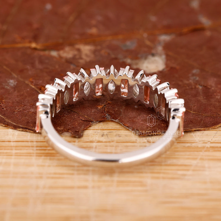 White gold wedding band with baguette diamonds.