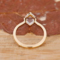 Custom diamond ring with tapered shank and Dutch marquise cut.