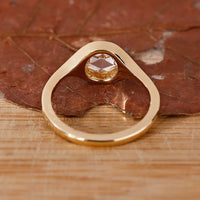 Handmade jewelry featuring bezel set diamond ring