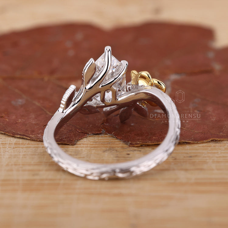 Buy engagement ring with Dutch marquise diamond and split shank style.