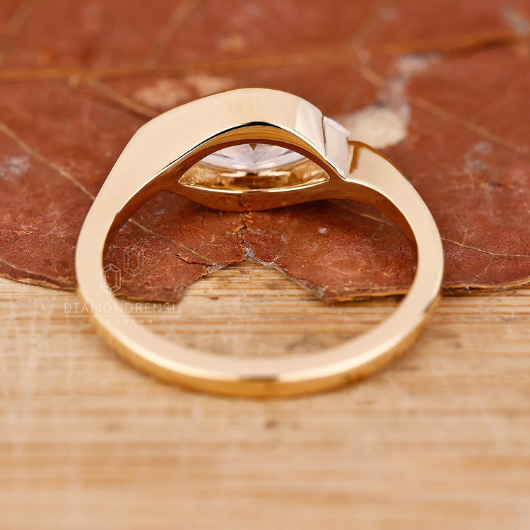 Handmade east west marquise engagement ring crafted with precision and style