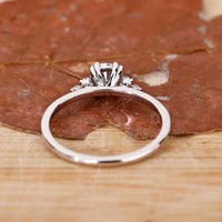 Buy Engagement ring in Round diamond muse setting.