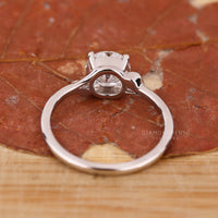White gold ring crafted as a solitaire engagement ring.