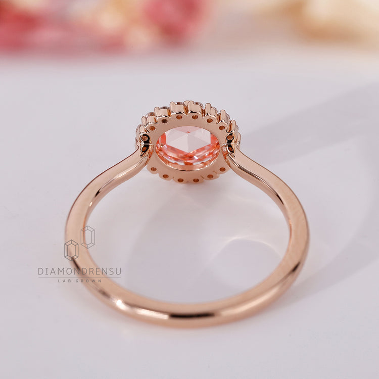 Buy engagement ring with pink diamond and rose gold band.