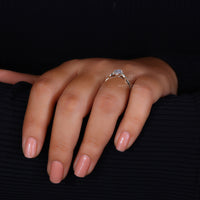 Marquise outline engagement ring with defined contours.