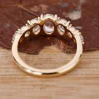 Designer pear diamond engagement ring style.