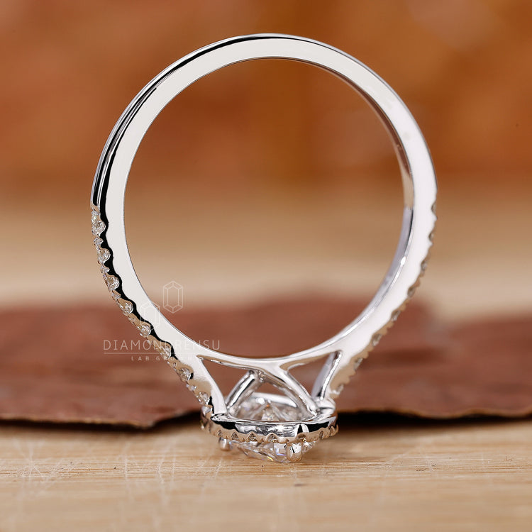 Unique marquise diamond engagement ring design.