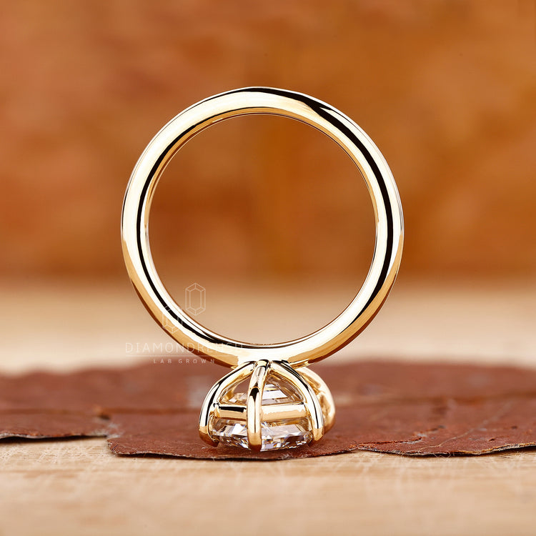 Lab grown diamond ring with yellow gold and classic solitaire cut.