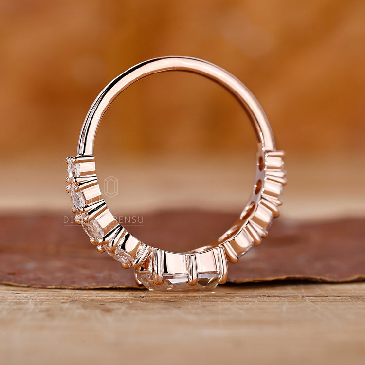 Lab grown diamond ring with rose cut oval and round stones.