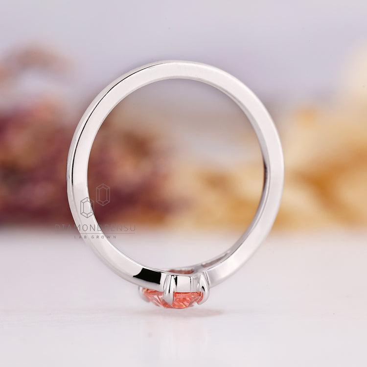 Lab grown diamond ring with pink pear cut in white gold.