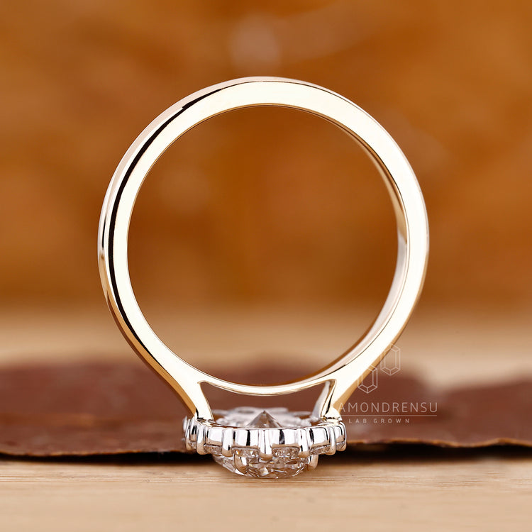 Unique round cut halo engagement ring design.