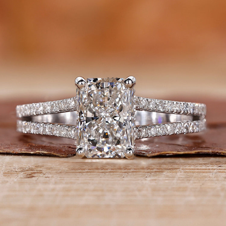 Radiant cut diamond ring set in white gold engagement ring.