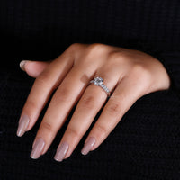 4 claw prong setting used in hidden halo engagement ring.