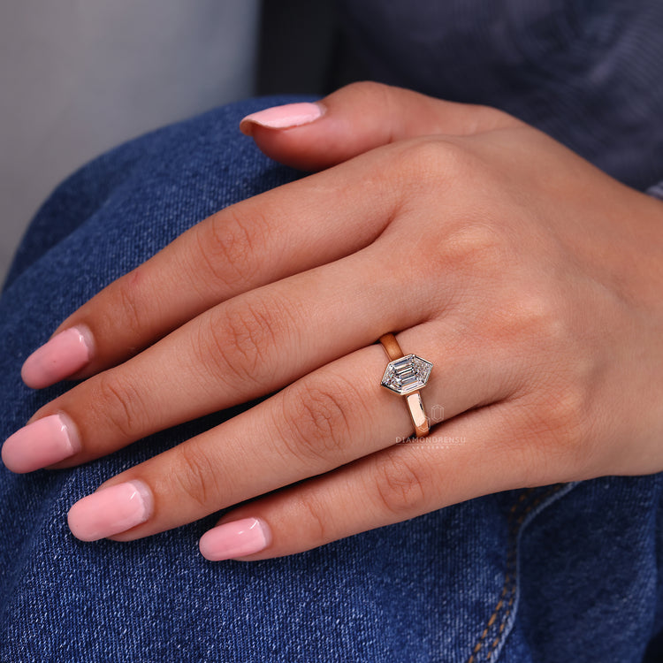 Yellow gold hexagon diamond engagement ring.