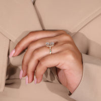Emerald diamond ring designed as a custom handmade piece.