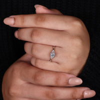 Round diamond muse setting in handmade ring.