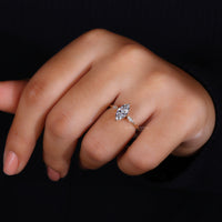 Round side stone ring with balanced and classic appeal.