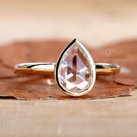 Custom pear solitaire ring by Diamondrensu Australia.