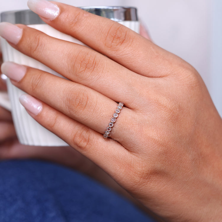 Shared Prong Setting Band featuring eternity style diamonds.