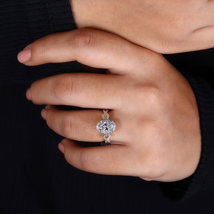 Custom ring in yellow gold with halo diamond ring design.