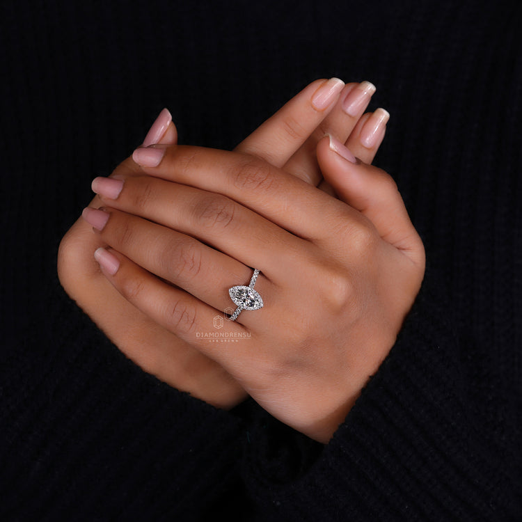 Cathedral setting round diamond engagement ring.