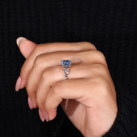Round and marquise diamond ring featuring timeless shapes.
