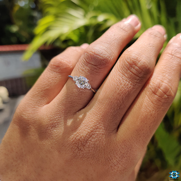 Round cut moissanite engagement ring design.