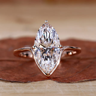 Marquise Diamond Engagement Ring with compass prong setting in rose gold.