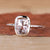 A detailed image showing the intricate bezel setting and cushion rose cut diamond. A detailed image showing the intricate bezel setting and cushion rose cut diamond.