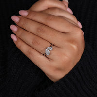 White gold ring with Toi Et Moi pear diamond design.